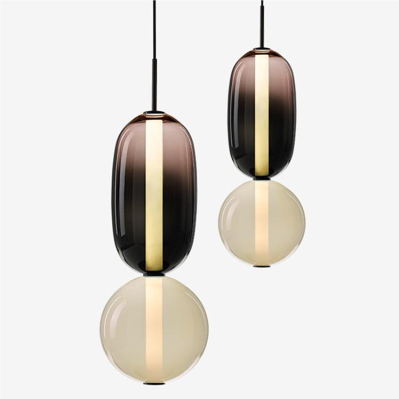 Syro LED-Pendelleuchte aus bonbonfarbenem Glas