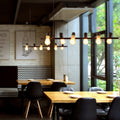 Epoch vintage LED-lysekrone — robust sort metalramme