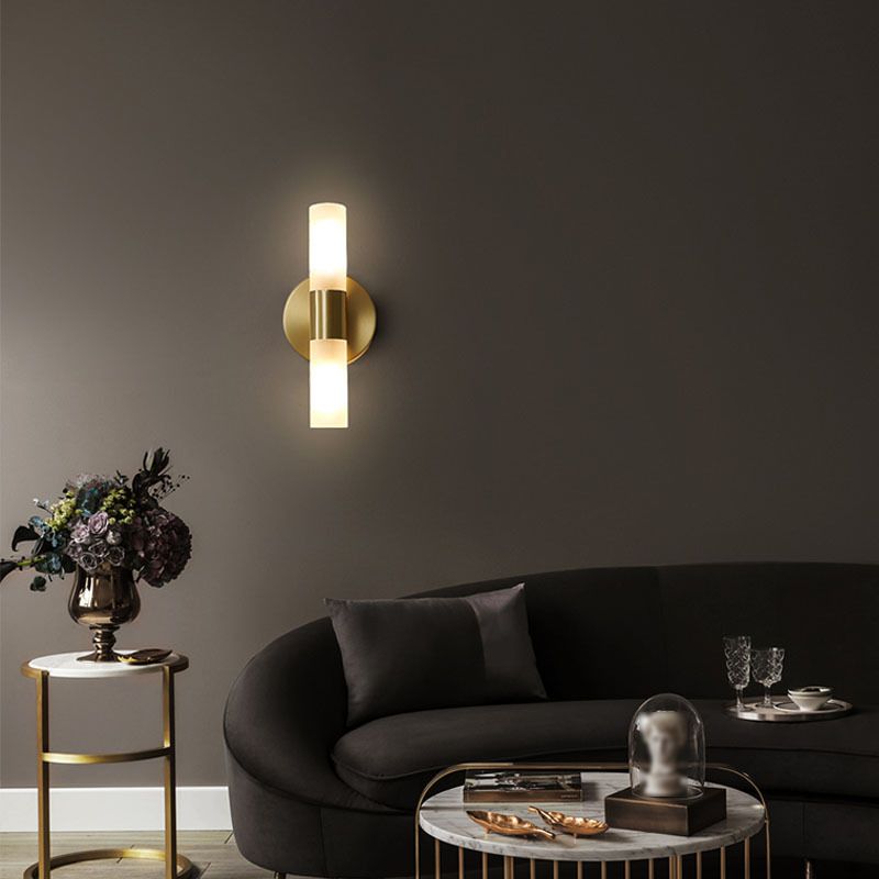 Arisha moderne cylindrisk LED-væglampe i guldmetal