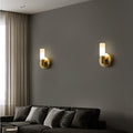 Arisha moderne cylindrisk LED-væglampe i guldmetal