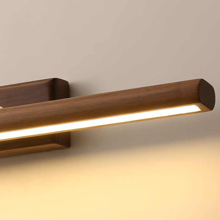 Obrotowa lampa ścienna Muto z lustrem z przodu — drewniana, podłączana na stałe, naturalne światło