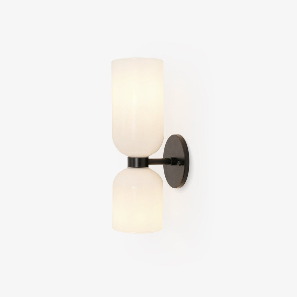 Edie moderne vegglampe – skulpturelt søyledesign, varm belysning