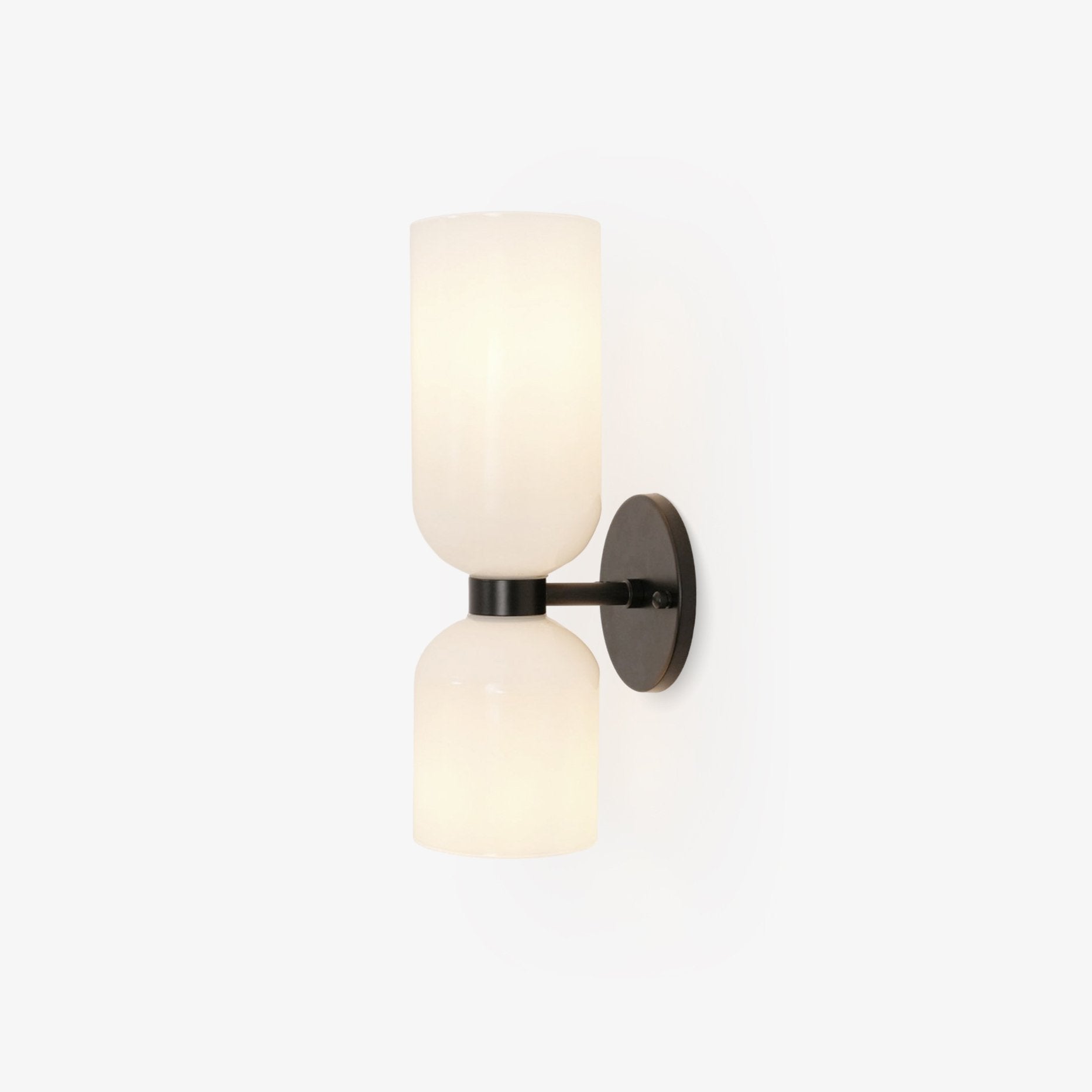 Edie moderne vegglampe – skulpturelt søyledesign, varm belysning
