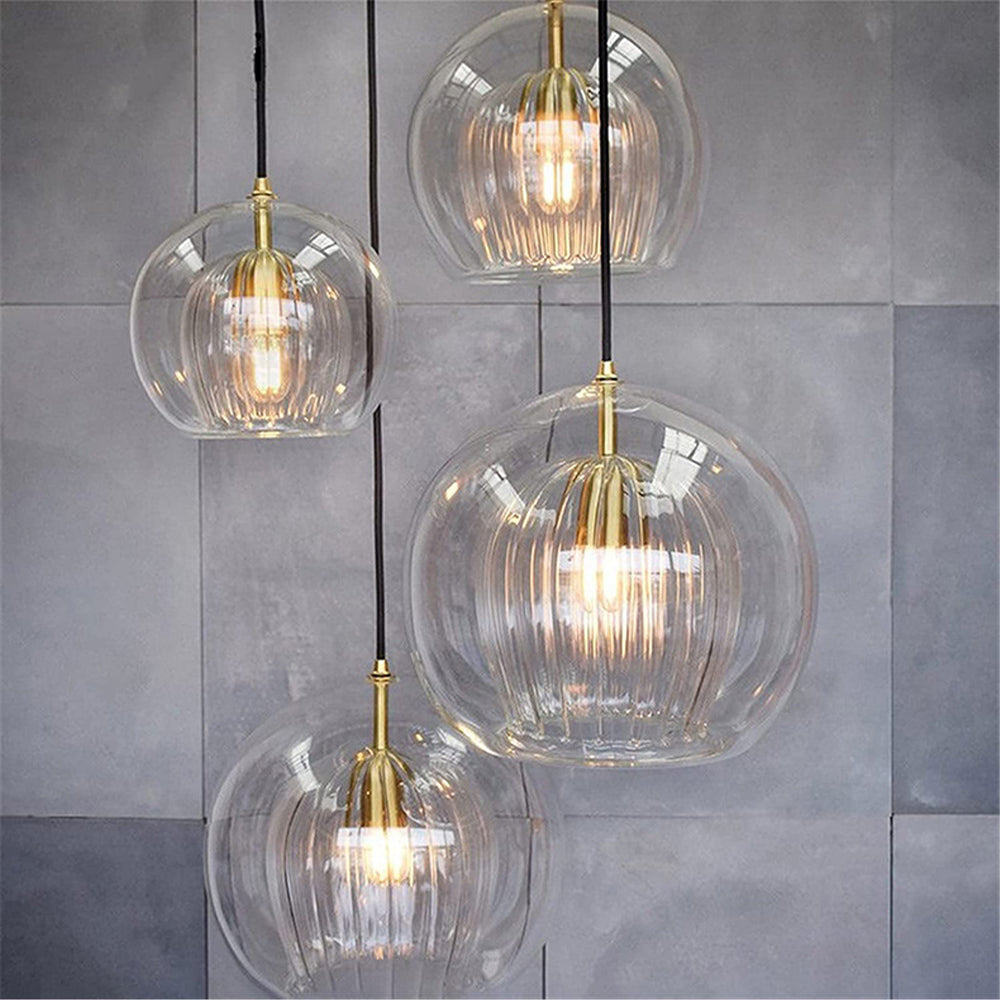June hanglamp met transparante en amberkleurige glazen bol