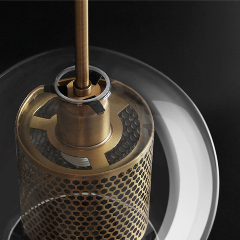 Hessa Contemporary Golden Pendant Light — Glass Globe and Cylindric Shape