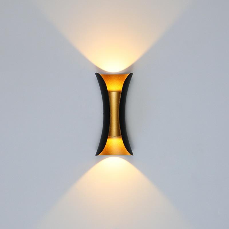 Applique murale LED extérieure incurvée Noxel — IP65, raccordement fixe