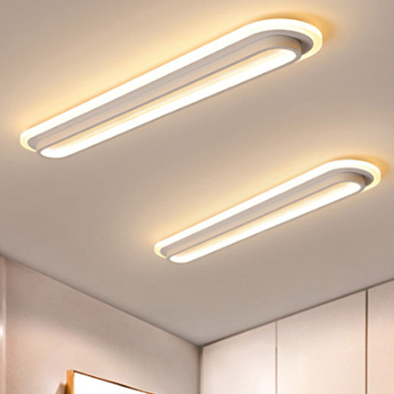 Owalna lampa sufitowa LED z akrylowym rozpraszaczem w czerni lub bieli