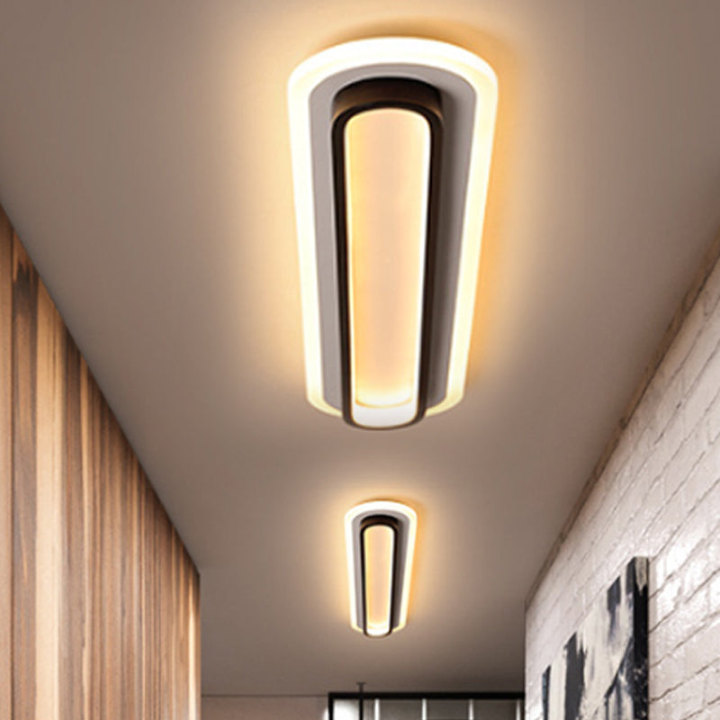 Owalna lampa sufitowa LED z akrylowym rozpraszaczem w czerni lub bieli