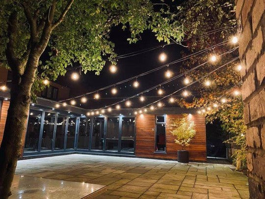 أضواء سلسلة خارجية مقاومة للماء قابلة للتوصيل بمقبس LED لون أبيض دافئ للاستخدام الشاق