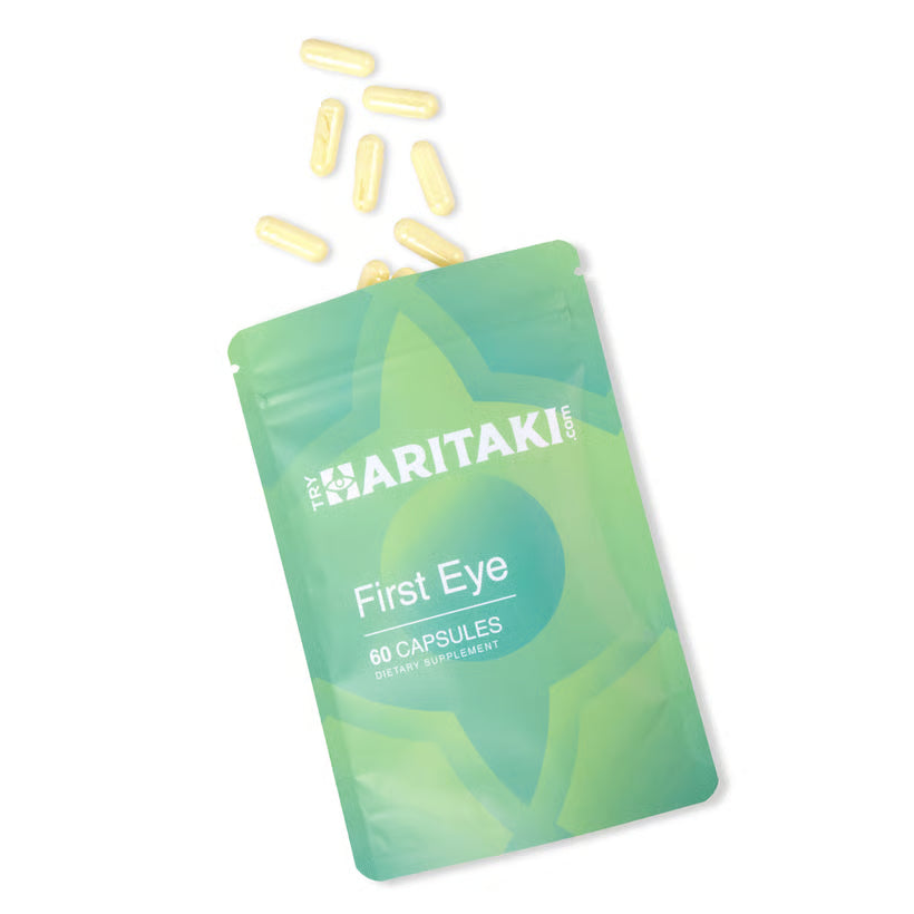 Pouch of haritaki capsules with capsules spilling out
