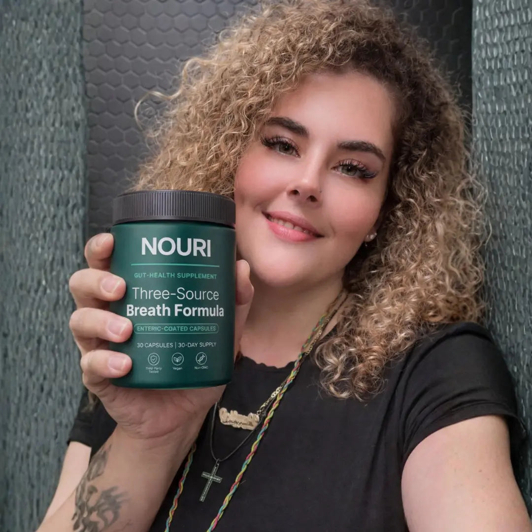 Woman smiling and holding the jar at home