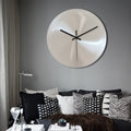 Reloj de pared minimalista de acero inoxidable - ¡Elegante y funcional!