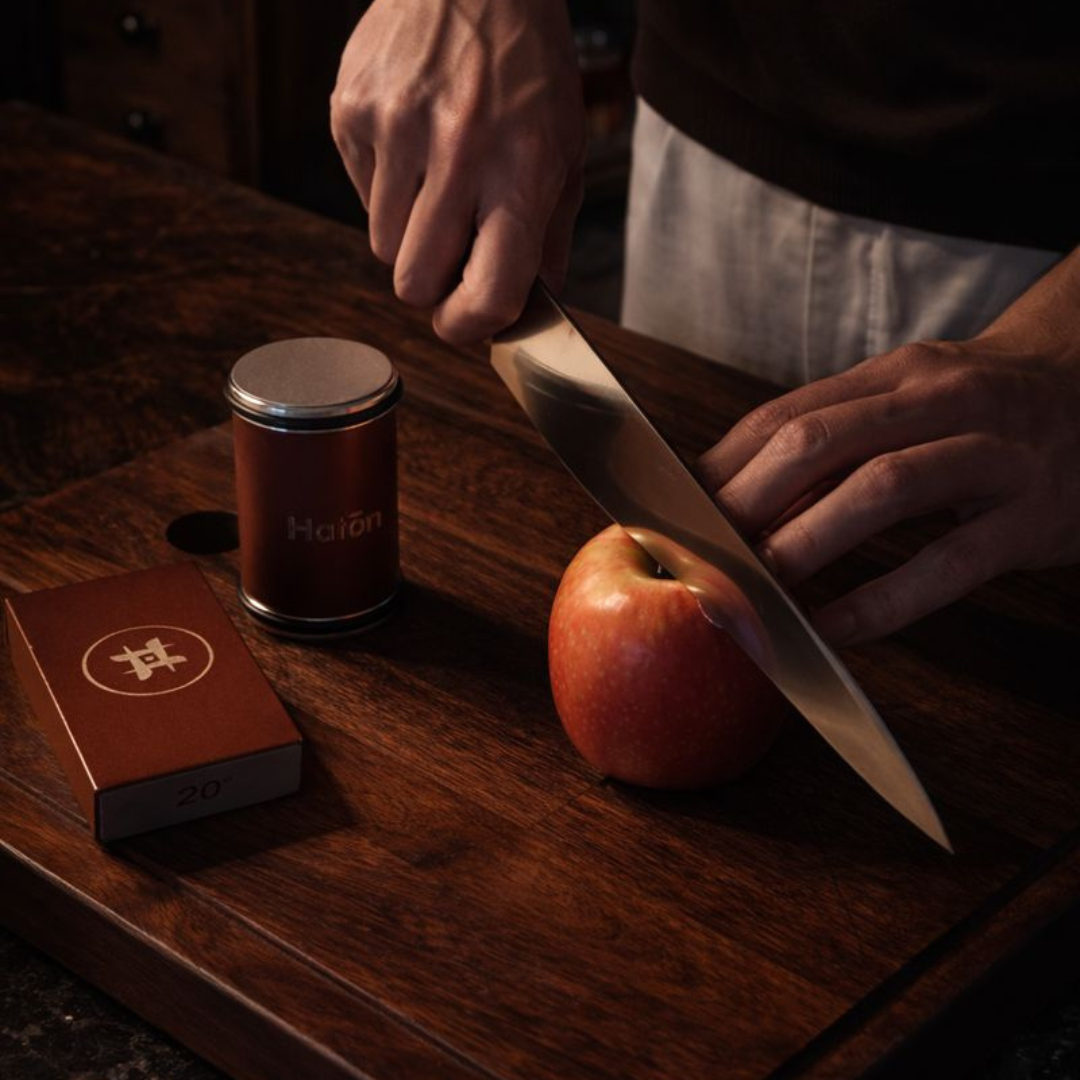 Cutting an apple with the sharpened knife