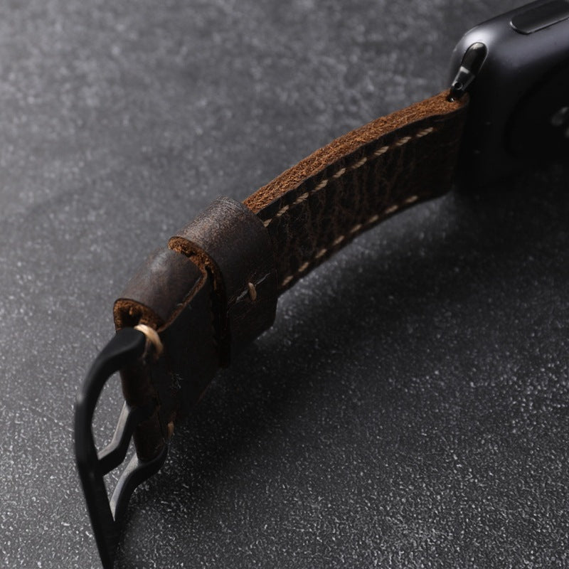 Håndlaget reim i førsteklasses kuhud for Apple Watch