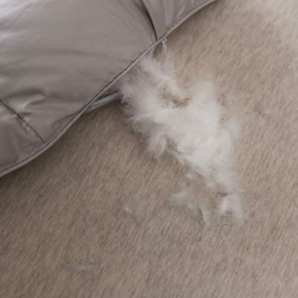 שמיכת נוצה אפורה אורנטלי אסטארה מספקת חום מפנק