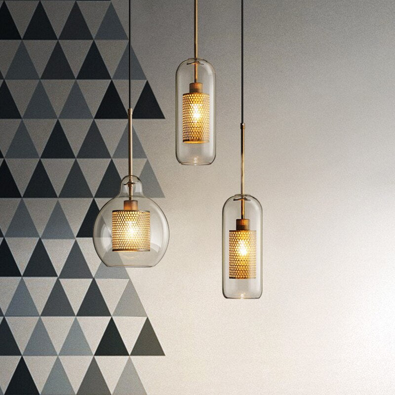 Hessa Contemporary Golden Pendant Light — Glass Globe and Cylindric Shape