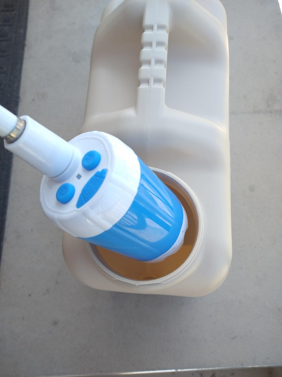 Pump inserted into the opening of a jerry can