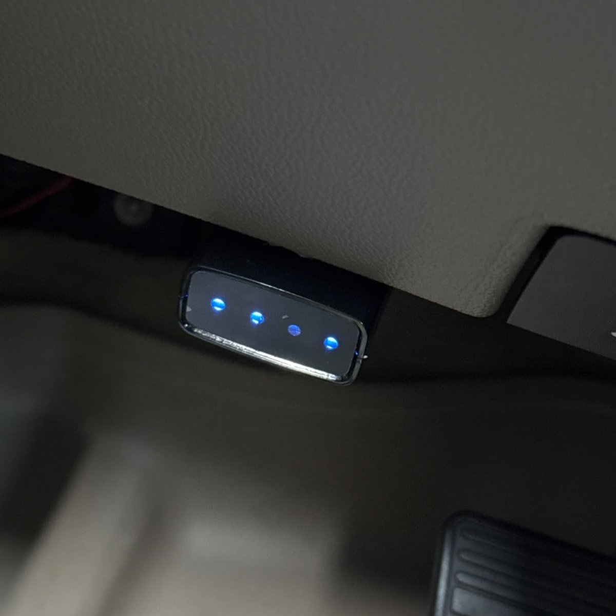 Blue LED lights on the plugged-in module confirming it is active