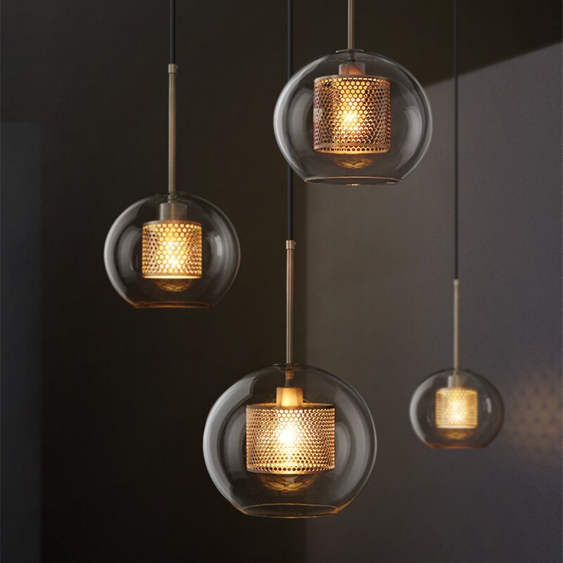 Hessa Contemporary Golden Pendant Light — Glass Globe and Cylindric Shape