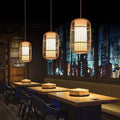 Suspension Kuro en rotin tressé à la main — Plafonnier vintage en bambou