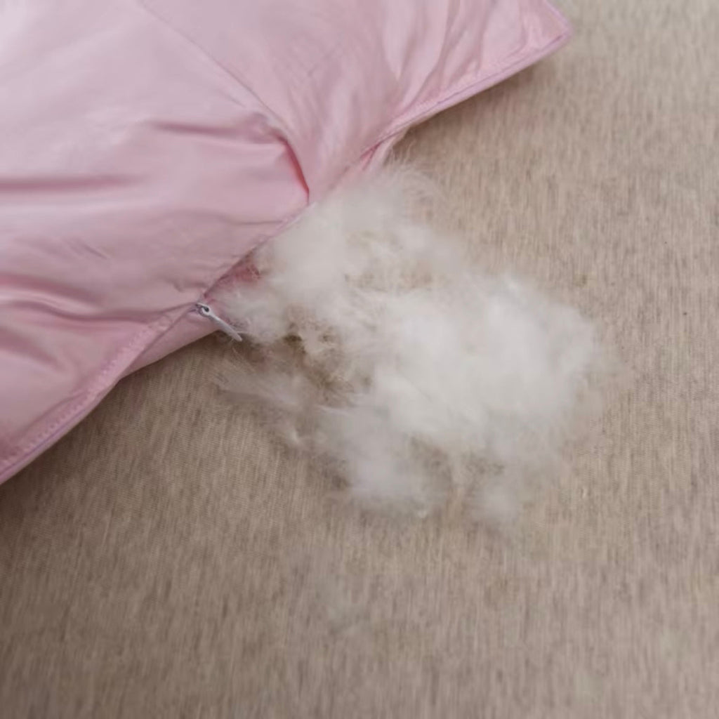 שמיכת נוצות אווז ורודה של ליארה לחמימות בכל עונה