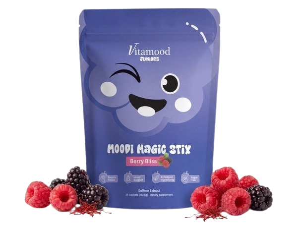 Pouch of saffron powder sticks with raspberries and blackberries