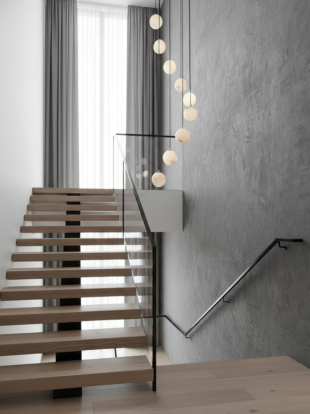 Lampadario a grappolo con sfere in alabastro a sospensione sfalsata