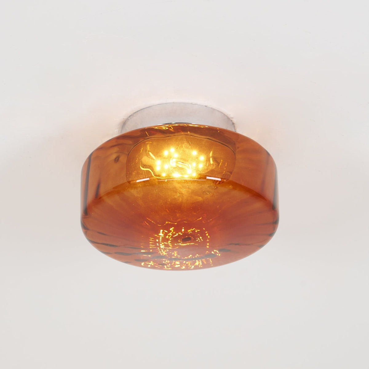 Plafonnier en verre ambré June — Abat-jour à motif rayonnant