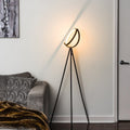 Astrae kruhová LED stojací lampa v černé barvě s elegantním zářícím kruhem