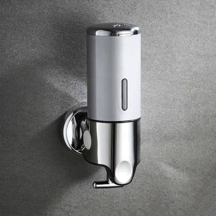 Wandgemonteerde zeepdispenser met modern ontwerp in roestvrij staal