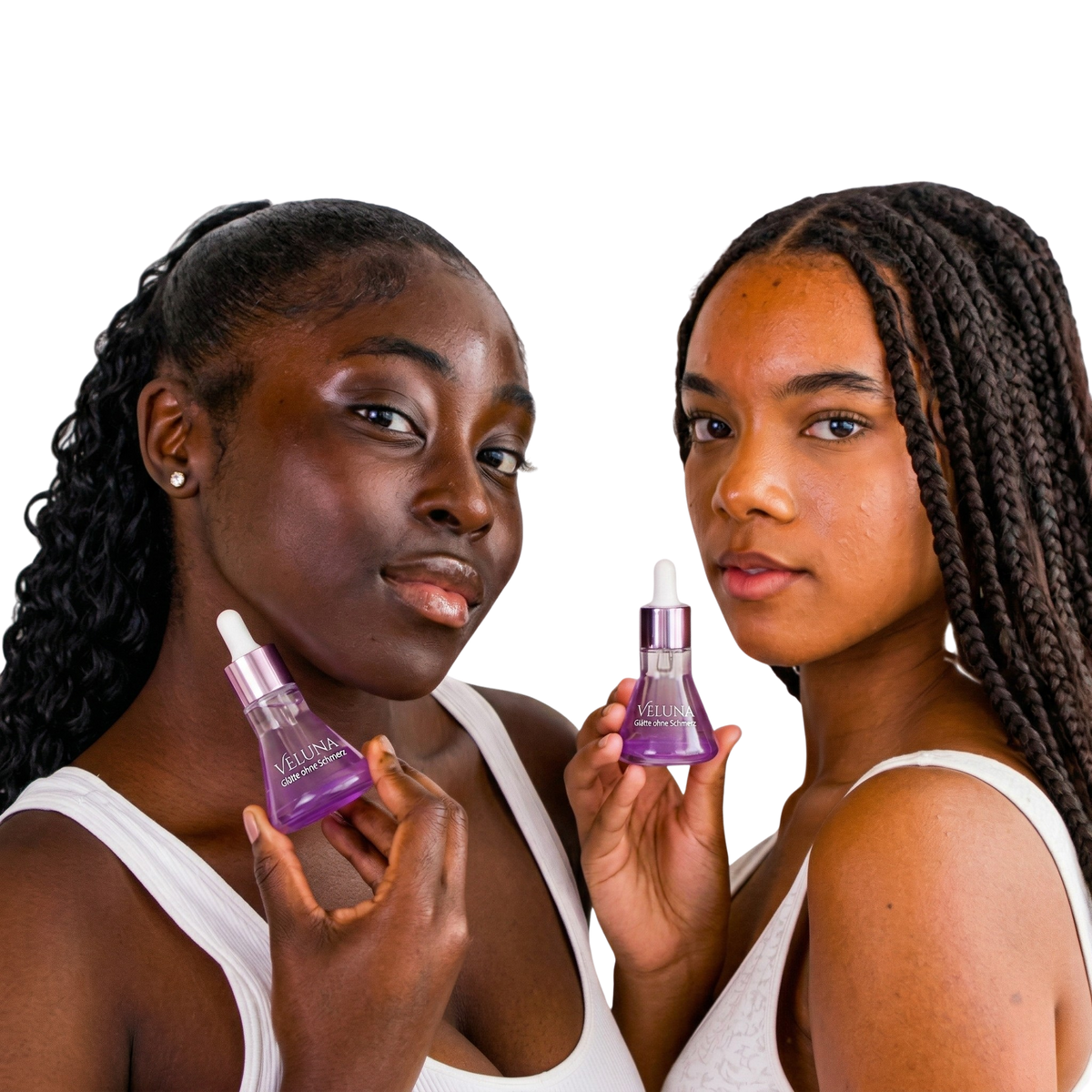 Two women smiling and holding a bottle of the serum
