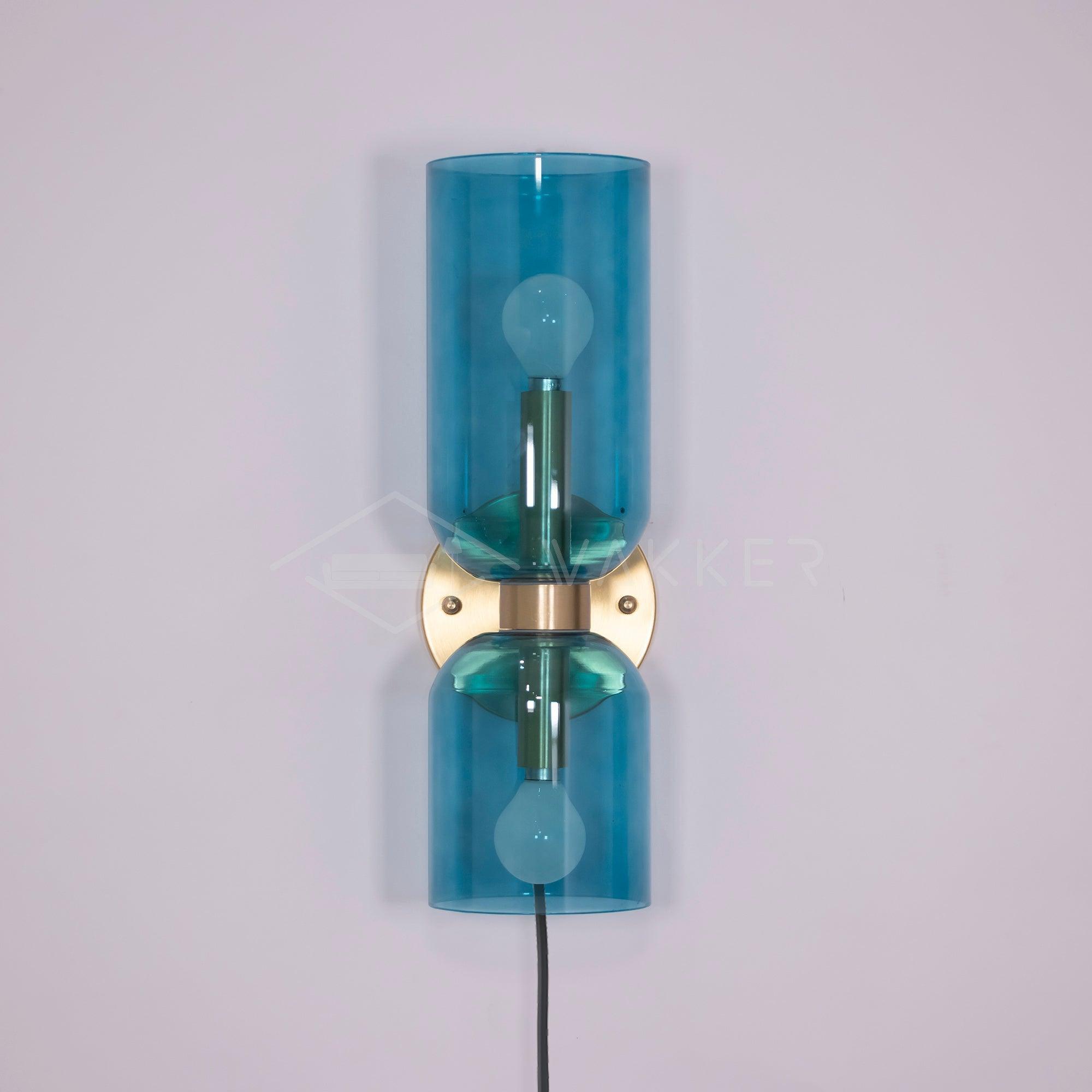 Edie vägglampa med stickpropp – överdimensionerad toppkolonndesign
