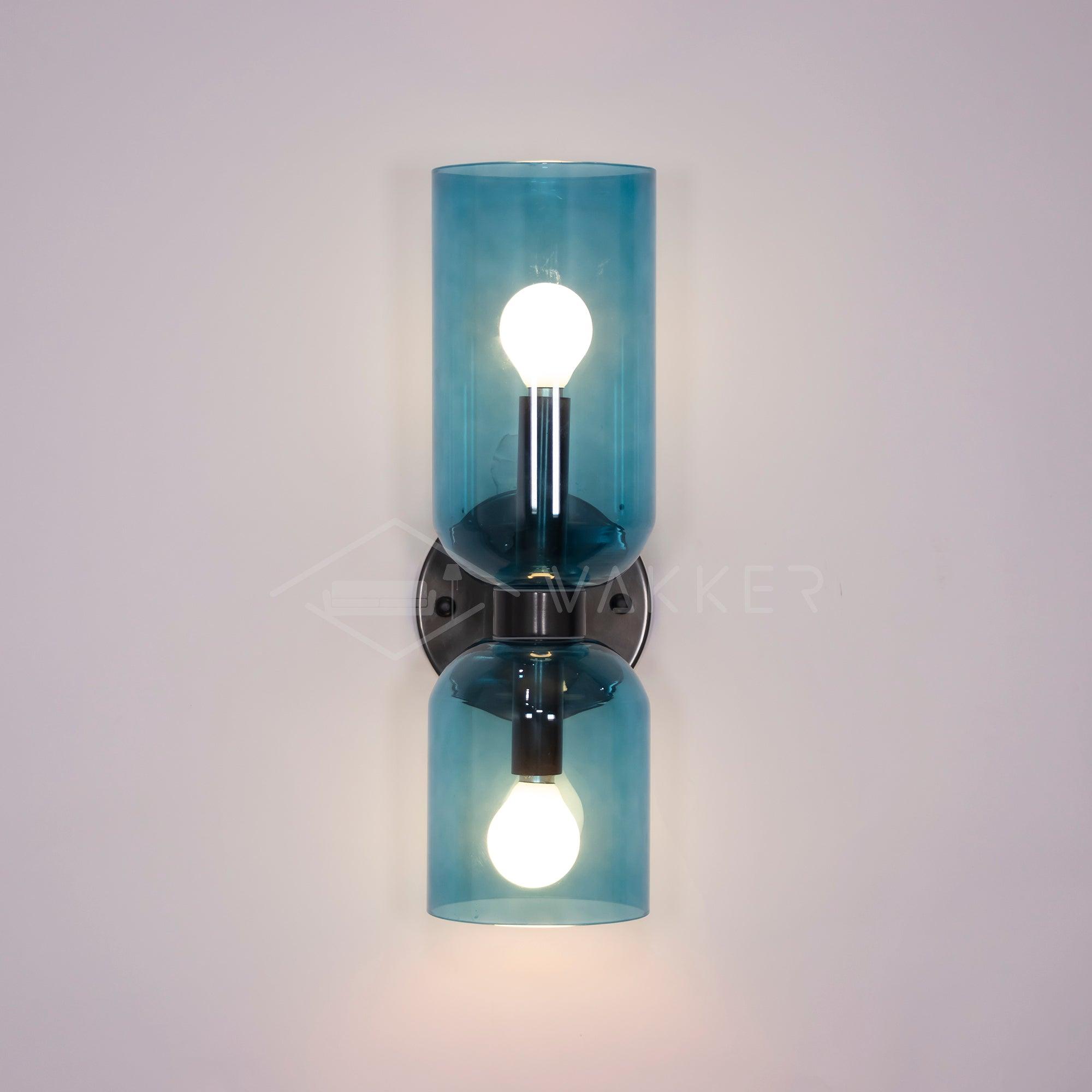 Edie moderne vegglampe – skulpturelt søyledesign, varm belysning