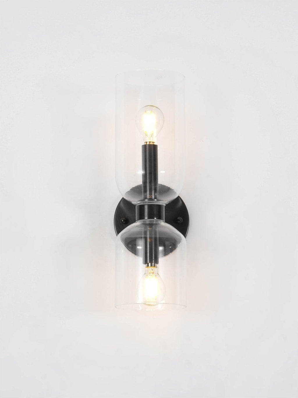 Edie moderne vegglampe – skulpturelt søyledesign, varm belysning