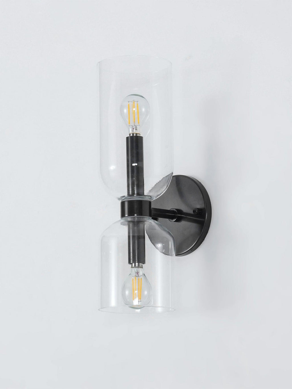 Edie moderne vegglampe – skulpturelt søyledesign, varm belysning