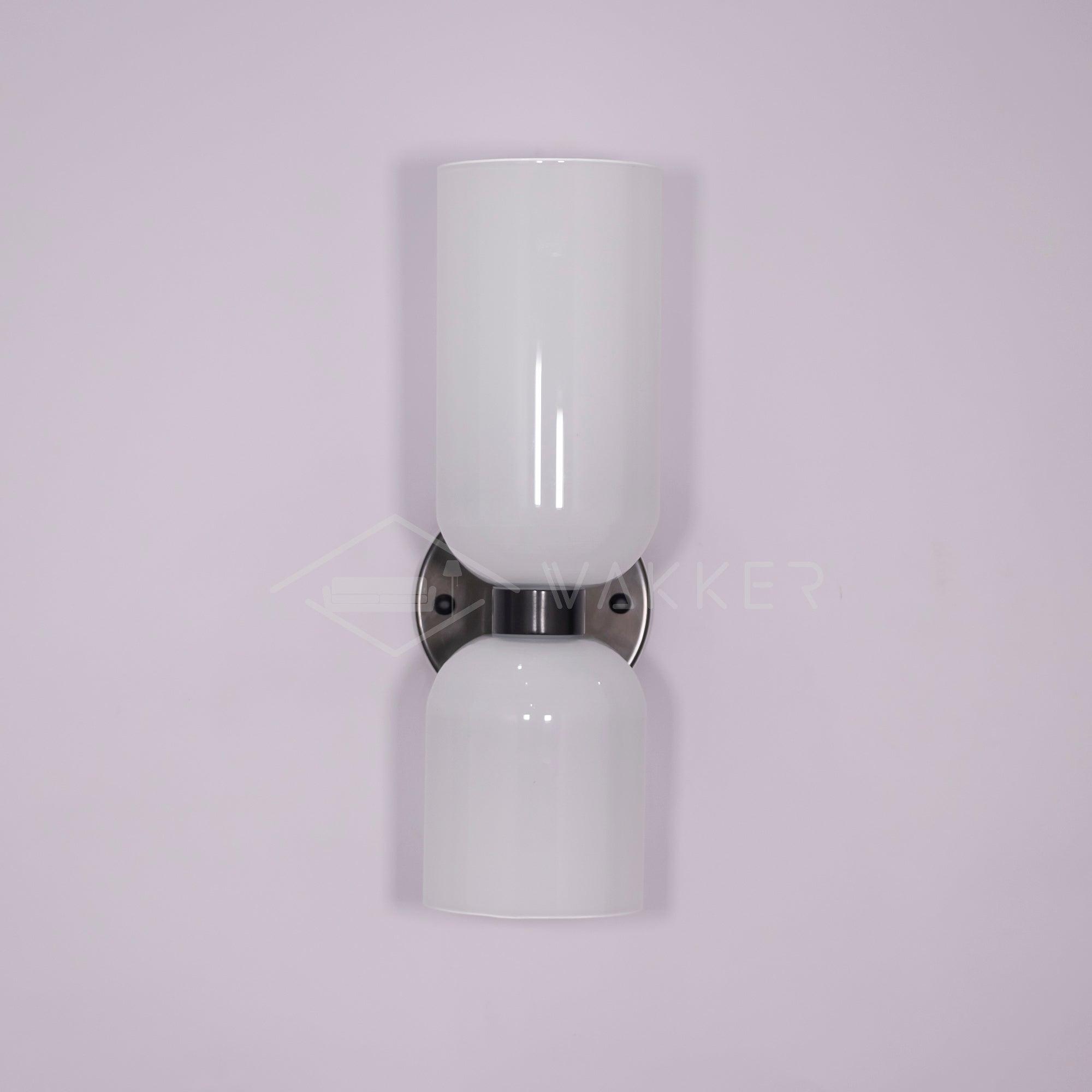 Edie moderne vegglampe – skulpturelt søyledesign, varm belysning