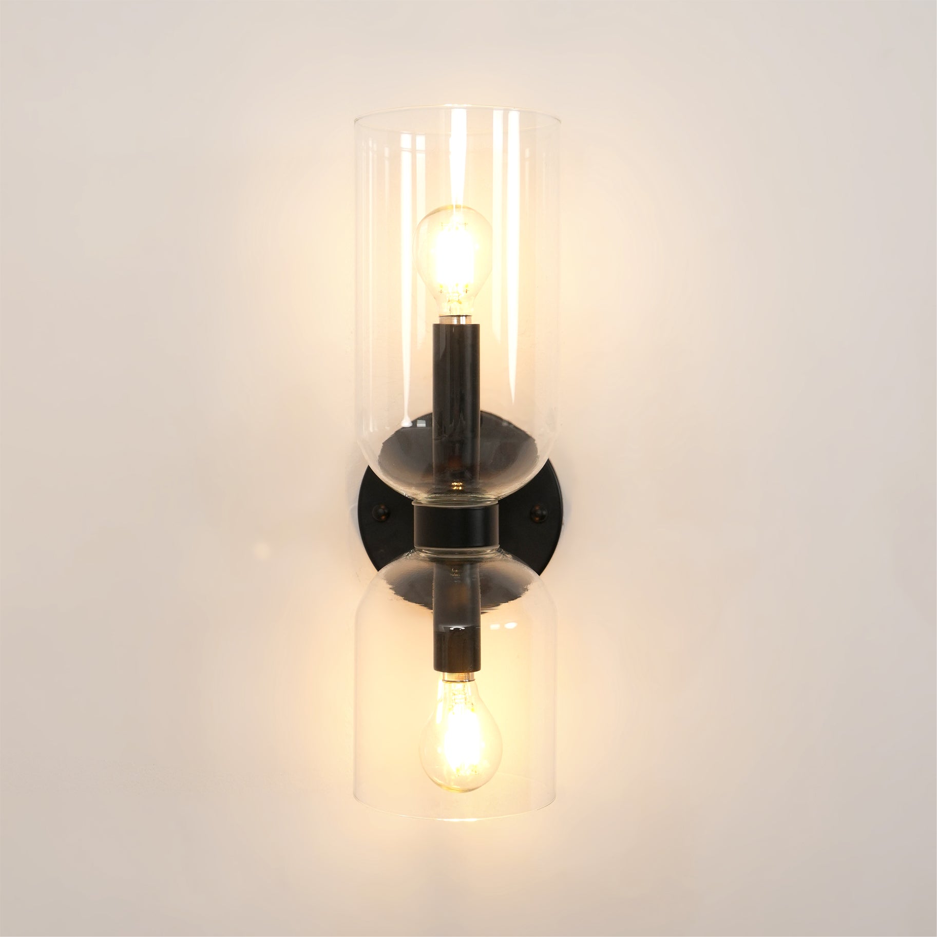 Edie moderne vegglampe – skulpturelt søyledesign, varm belysning