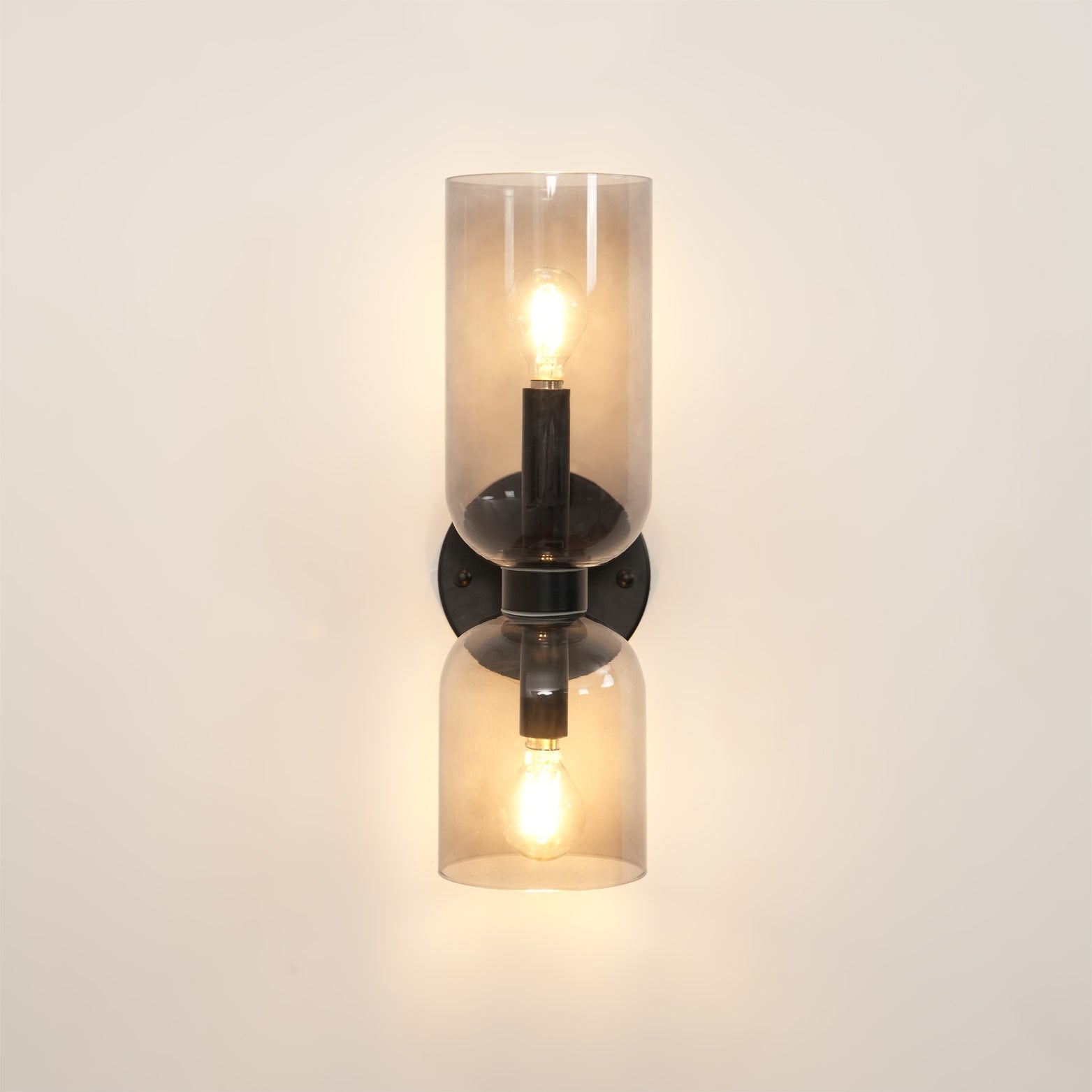 Edie moderne vegglampe – skulpturelt søyledesign, varm belysning