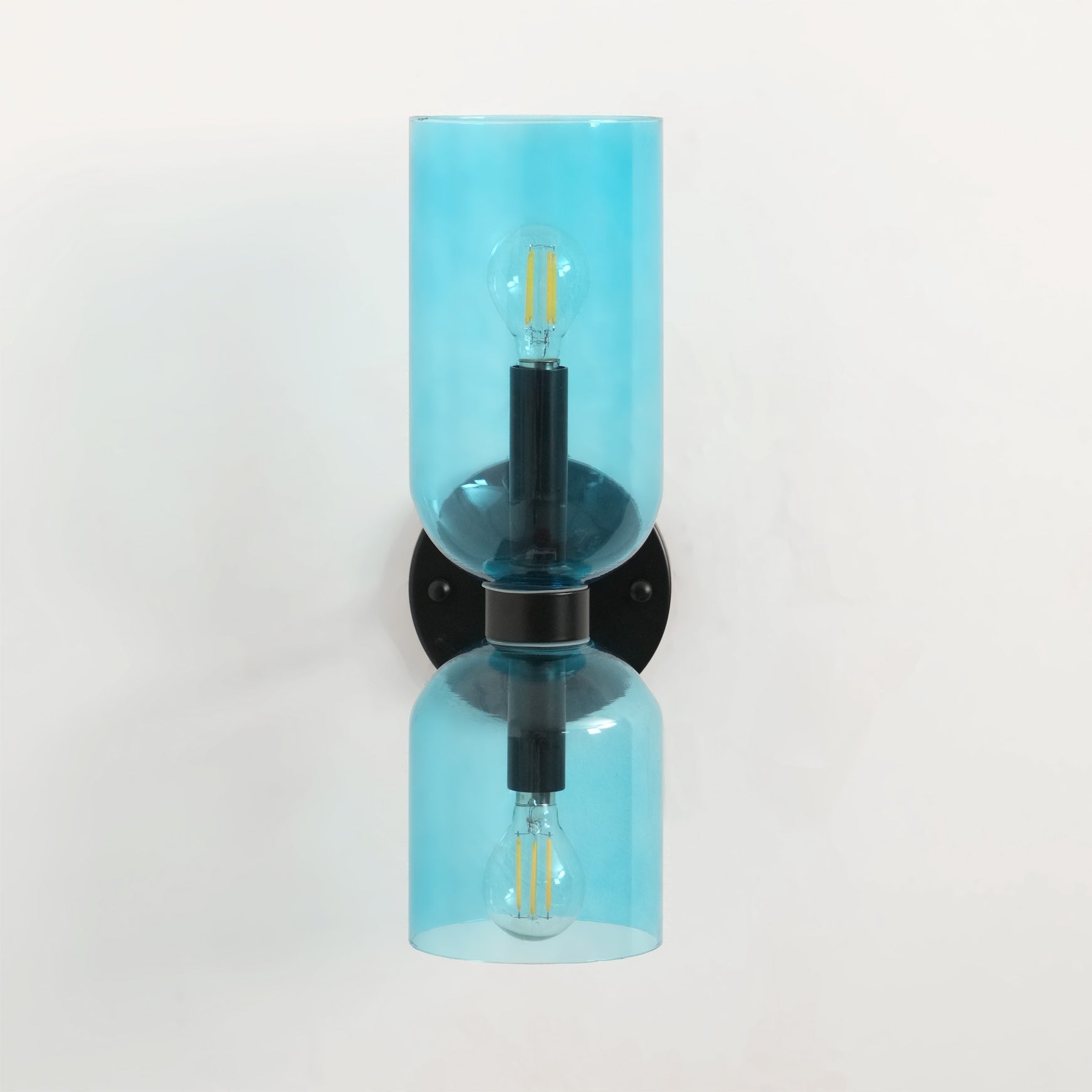 Edie moderne vegglampe – skulpturelt søyledesign, varm belysning
