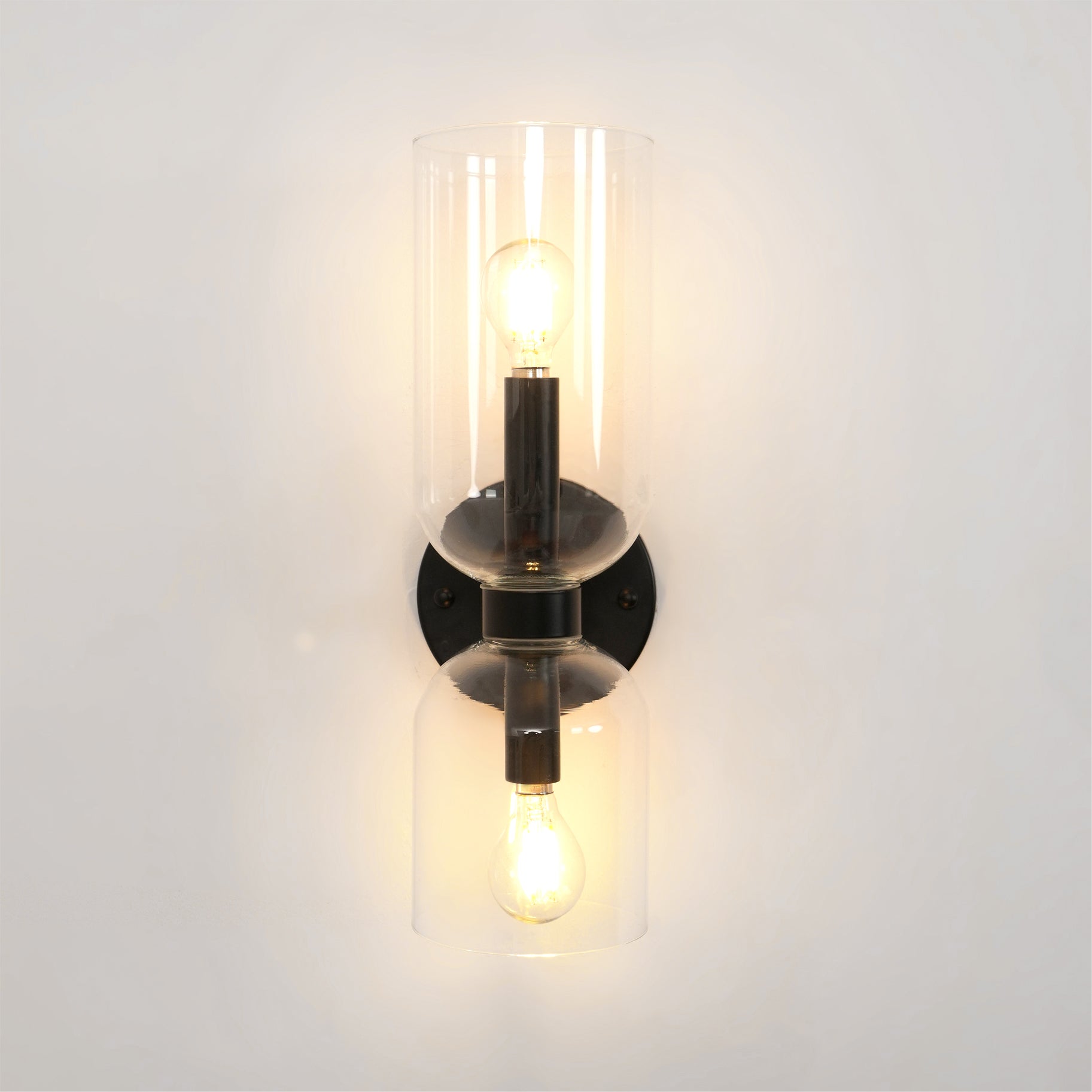 Edie moderne vegglampe – skulpturelt søyledesign, varm belysning