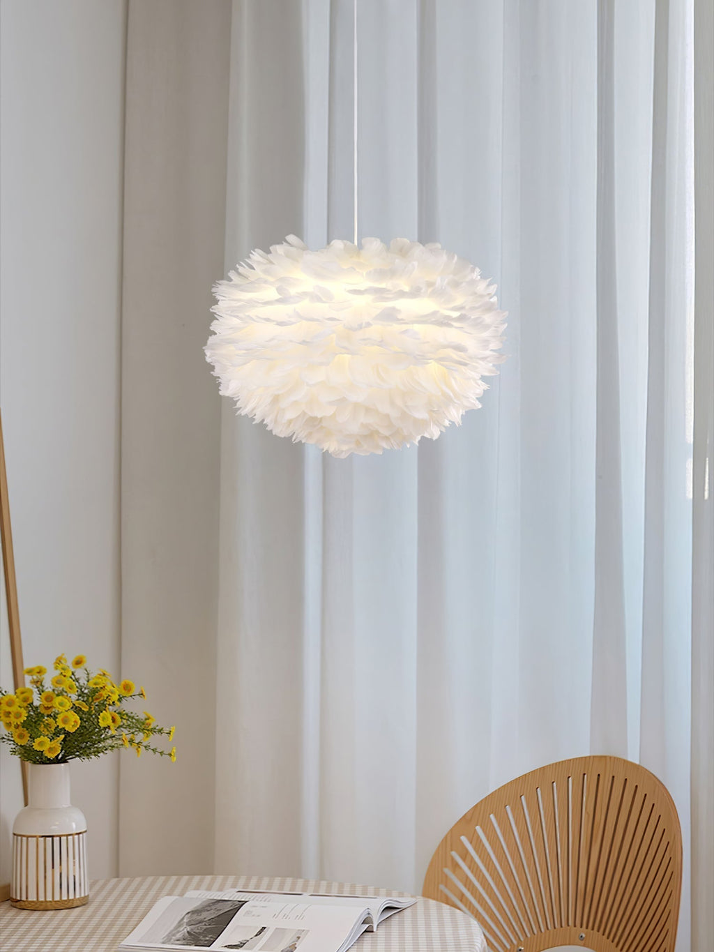 Goose Feathers Pendant Lamp — Thousands of Responsibly Sourced Feathers Around White Core