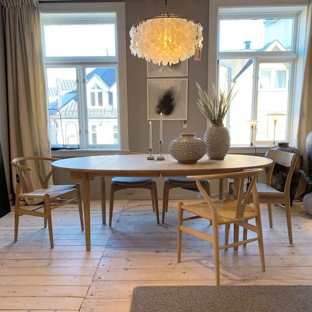 Kulatý lustr s více úrovněmi a skořepinami — design z průsvitných disků
