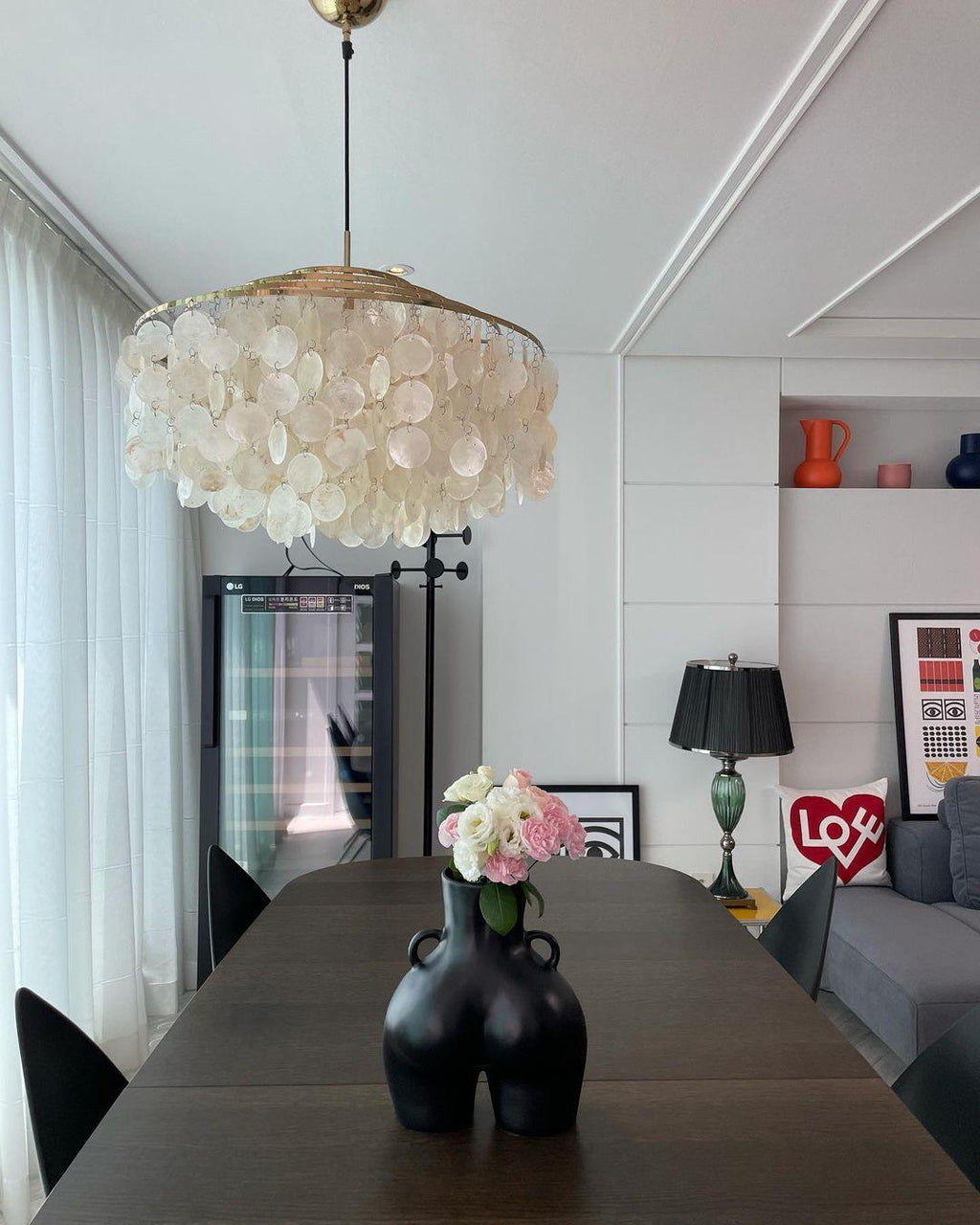 Kulatý lustr s více úrovněmi a skořepinami — design z průsvitných disků