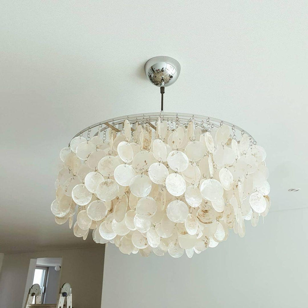 Kulatý lustr s více úrovněmi a skořepinami — design z průsvitných disků