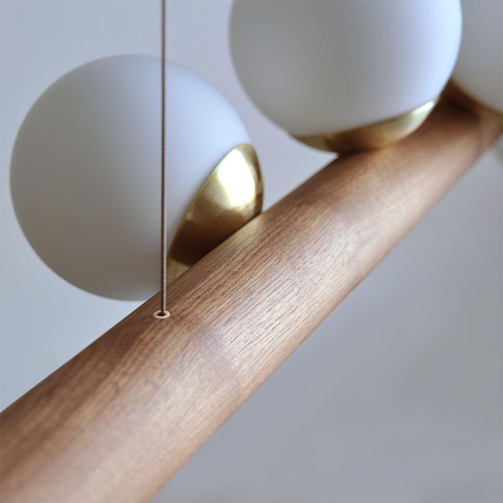 Contemporary Scandinavian Wooden Pendant Light — Linear Staggered Globes