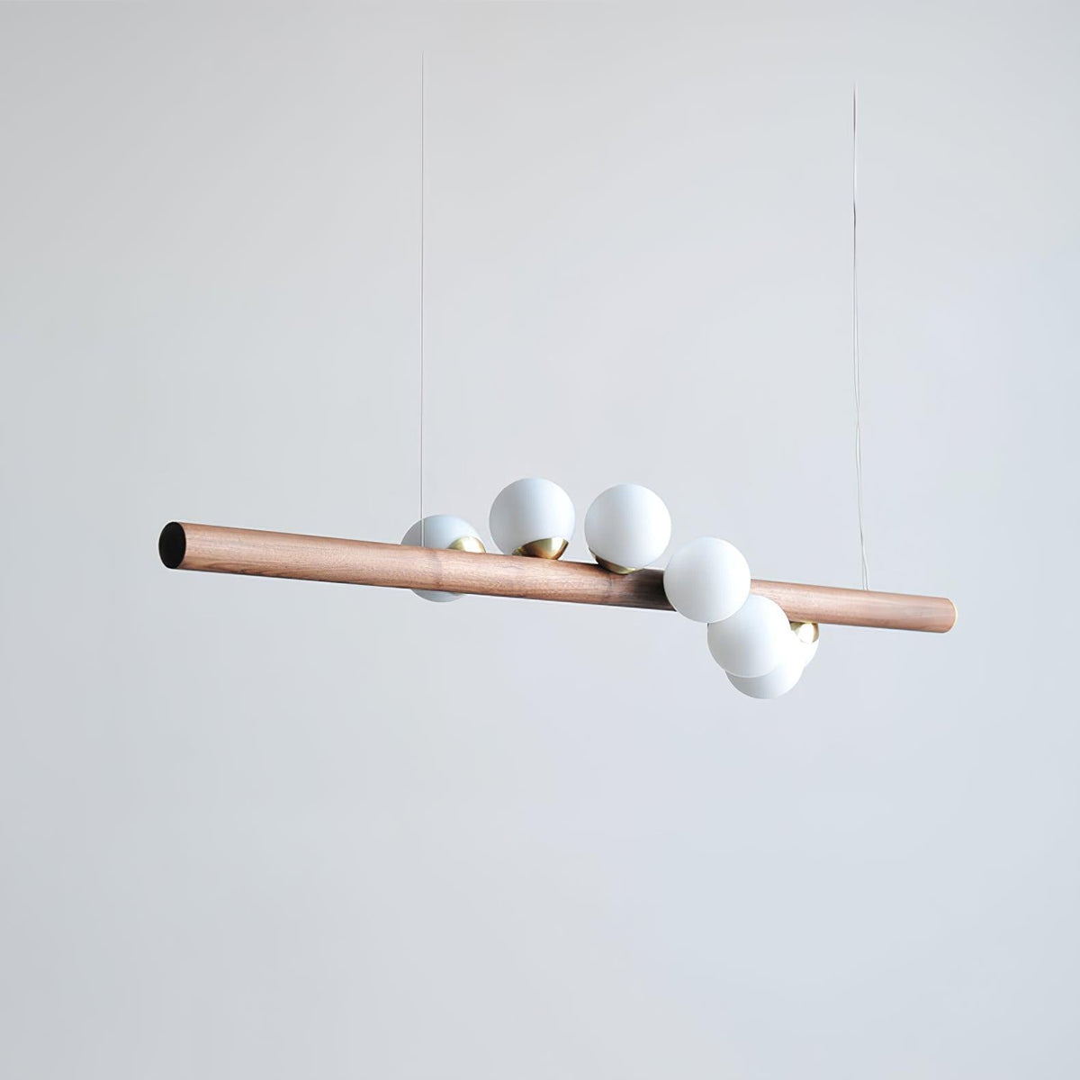 Contemporary Scandinavian Wooden Pendant Light — Linear Staggered Globes