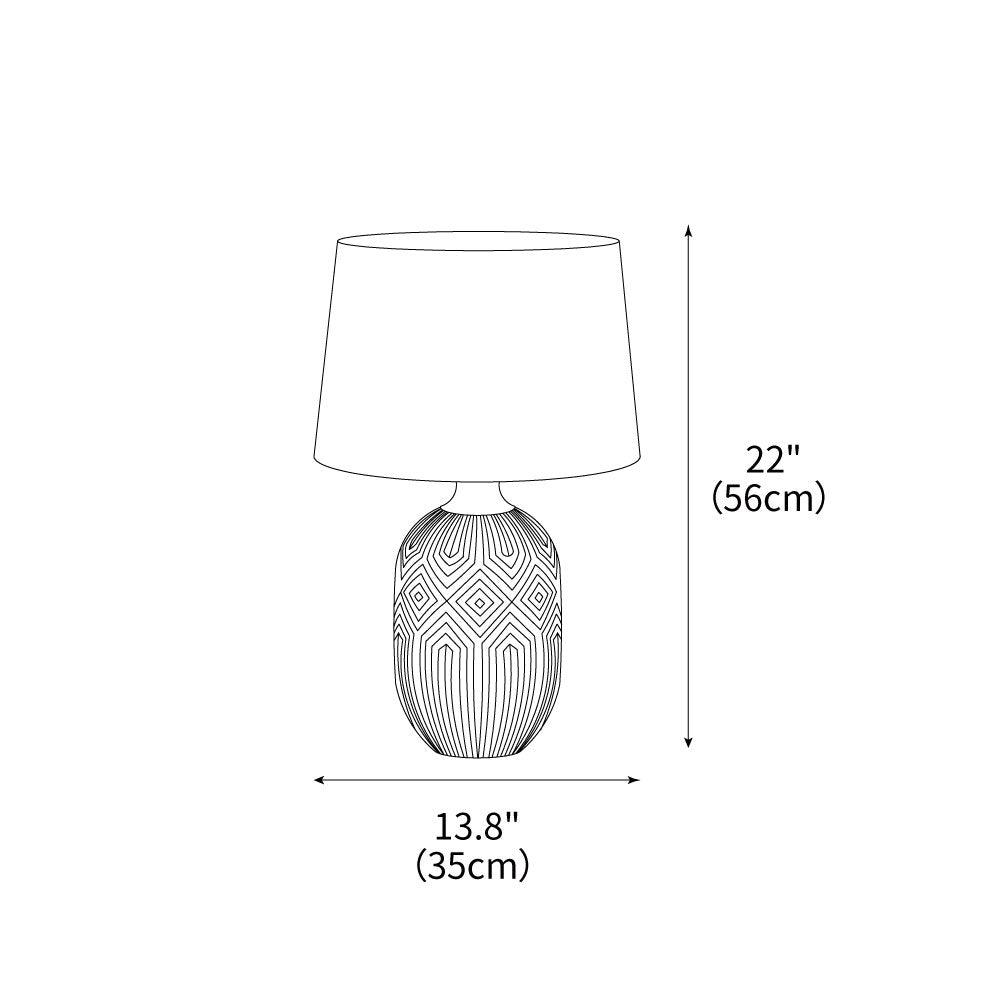 Geometrisk bordlampe i keramikk med bølgemønster — skulpturelt bølgedesign