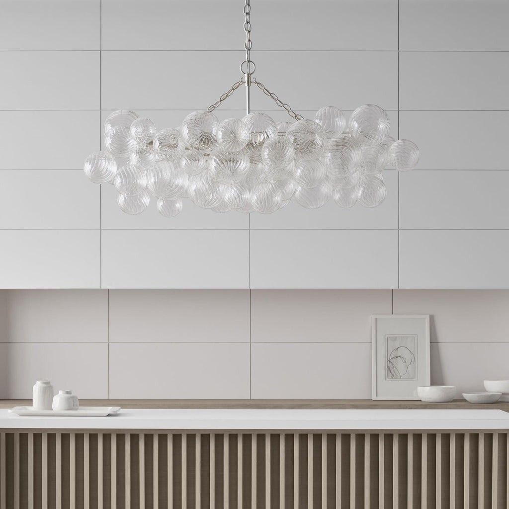 Aurora moderne boblelysekrone i glas — klare kugler i rillet glas, guldkæde og -base