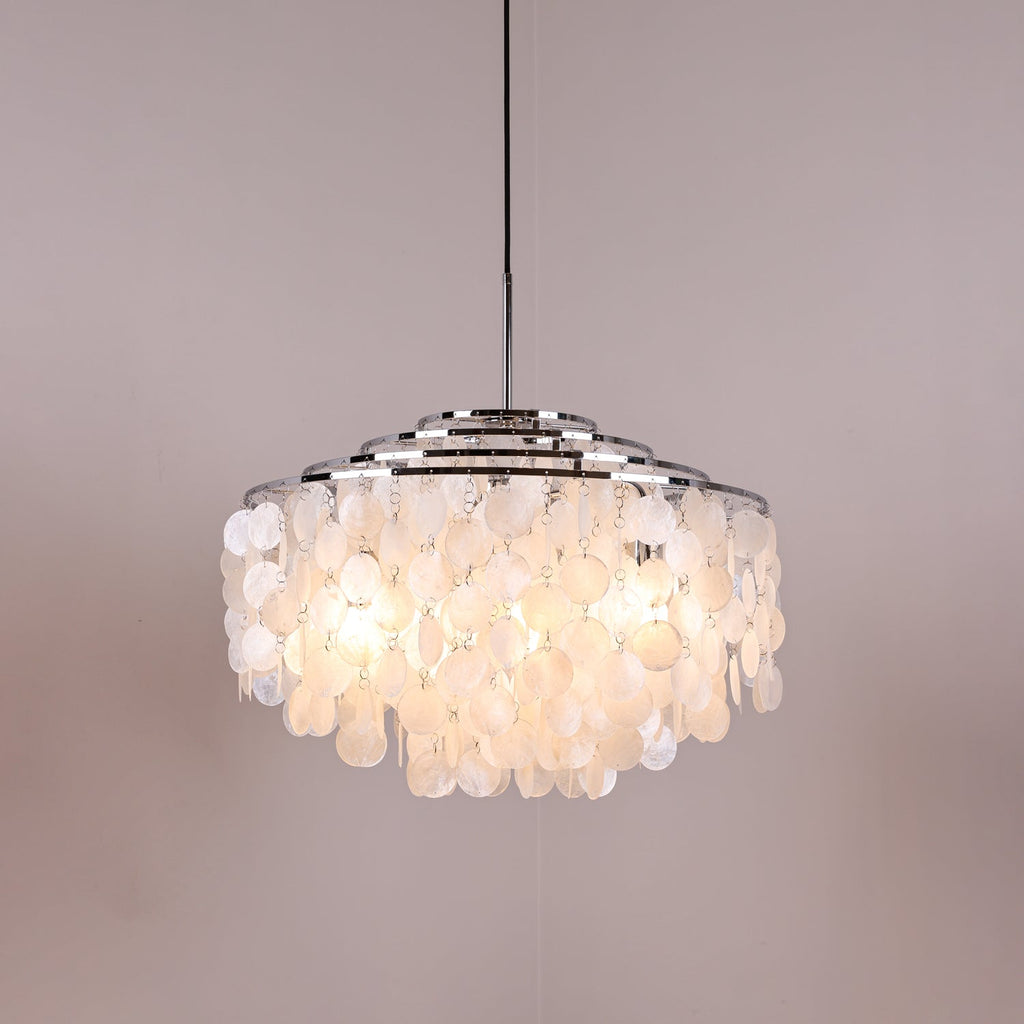Kulatý lustr s více úrovněmi a skořepinami — design z průsvitných disků
