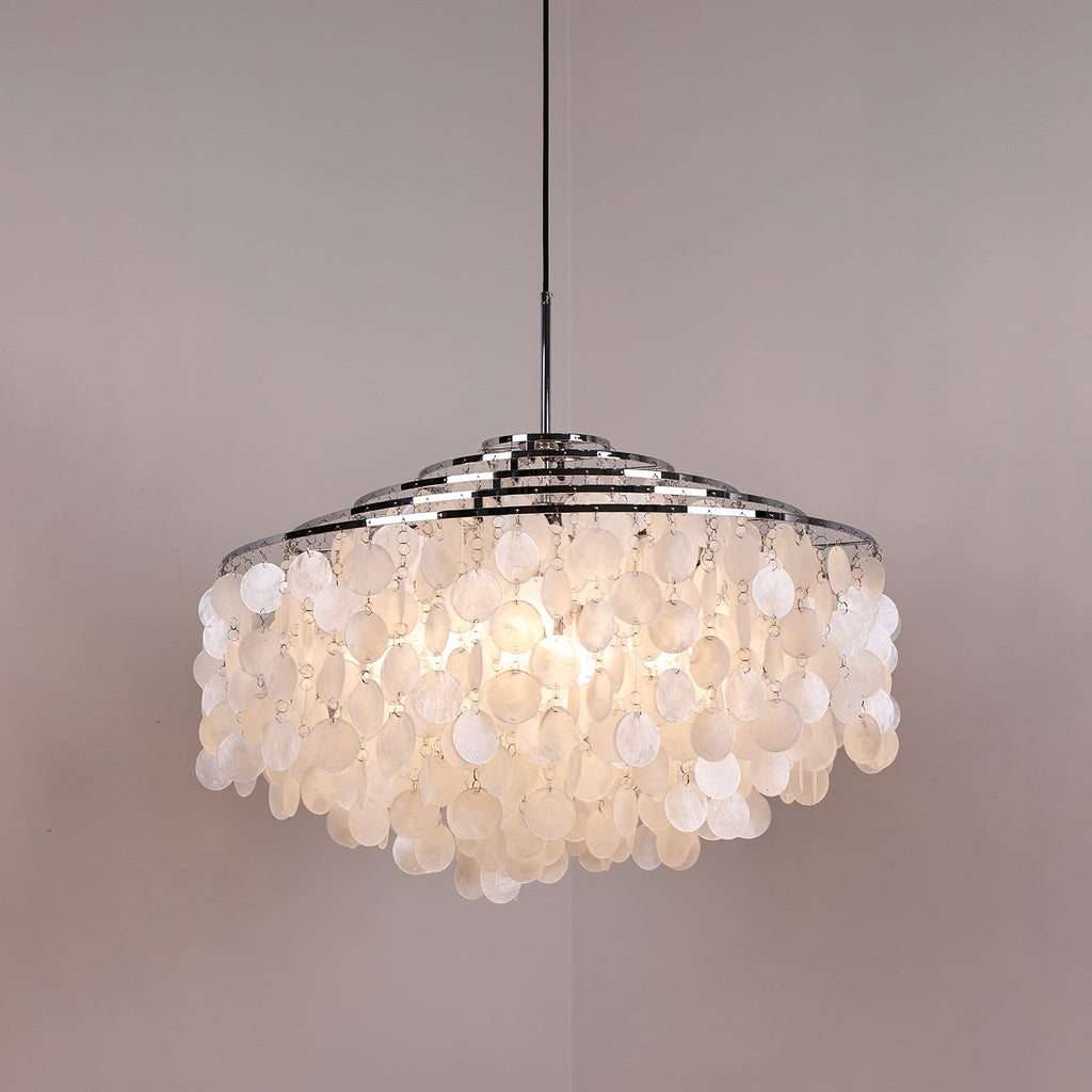Kulatý lustr s více úrovněmi a skořepinami — design z průsvitných disků